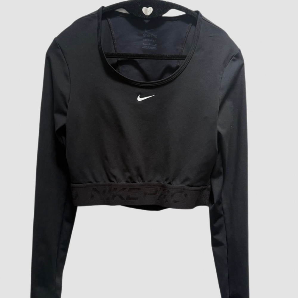 Nike Dri Fit all black Long-Sleeve Cropped Performance Top with White Swoosh